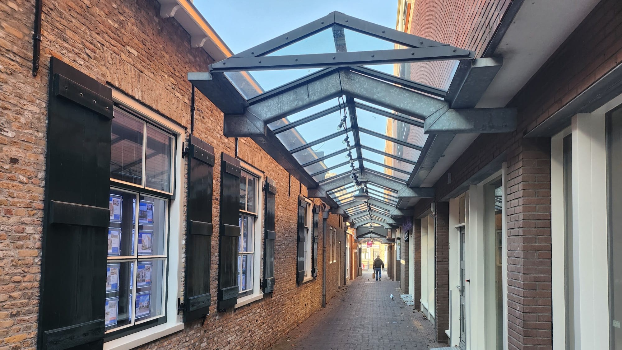 Onderzoek naar verwijderen overkapping Ambachtsgang: ‘Zou een groot gemis zijn’